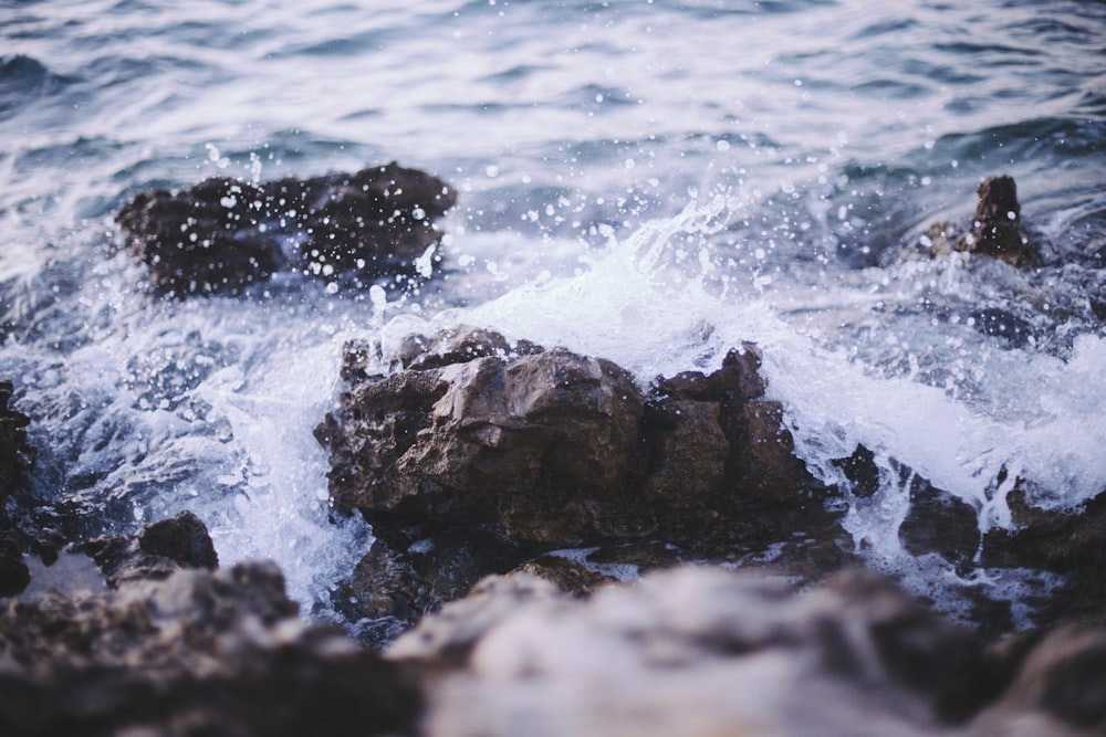 water splash on rock