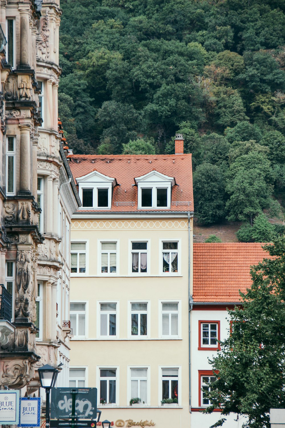 a tall building with a clock on the side of it