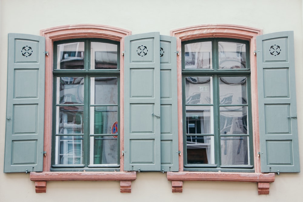 blue wooden window panes