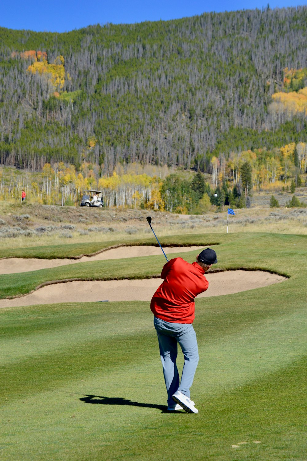 man playing golf during daytime