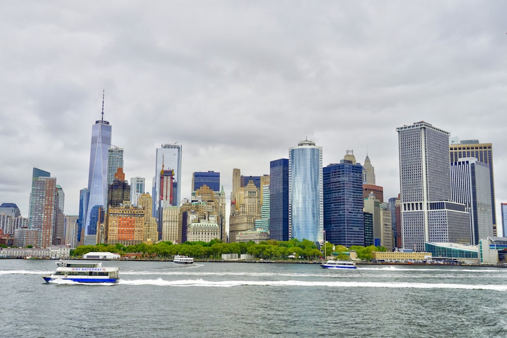 high-rise buildings under cloudy sky