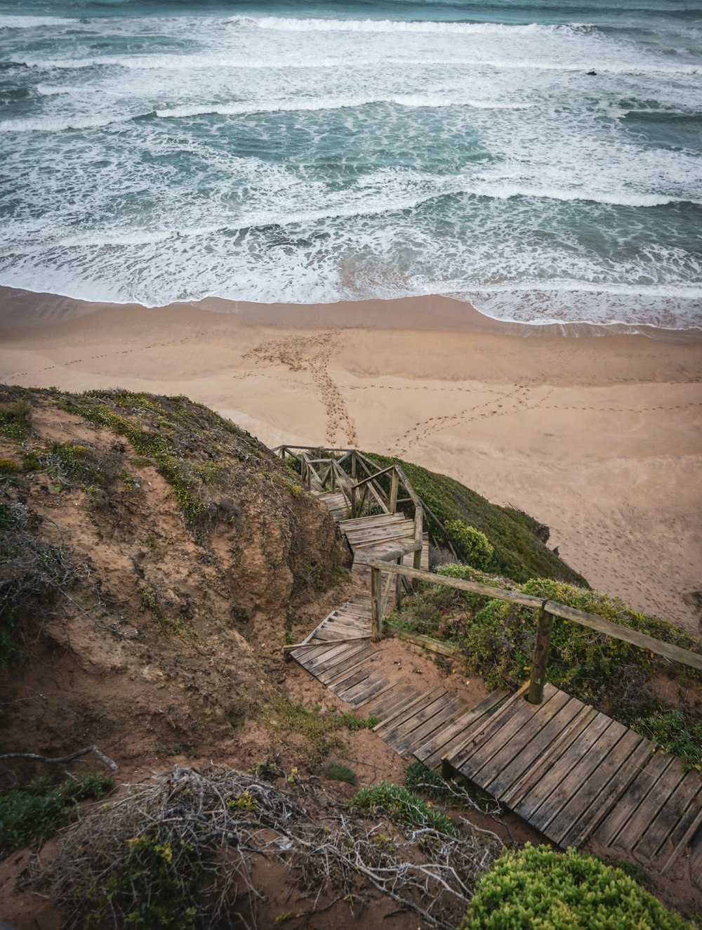 brown mountain and shore