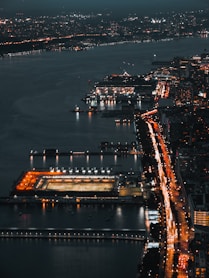 aerial photography of sea beside buildings