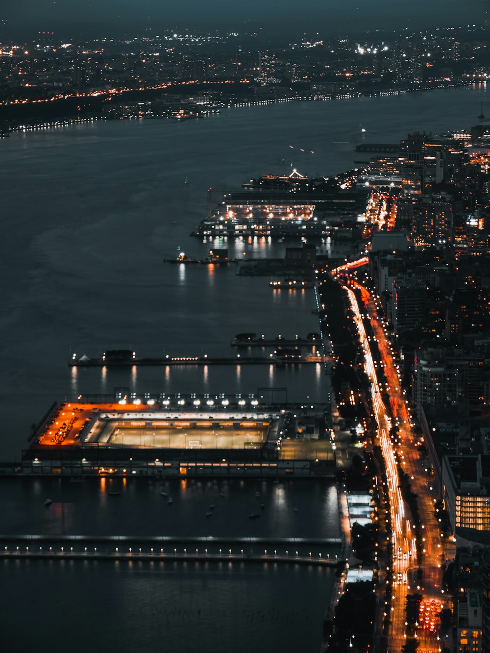 aerial photography of sea beside buildings