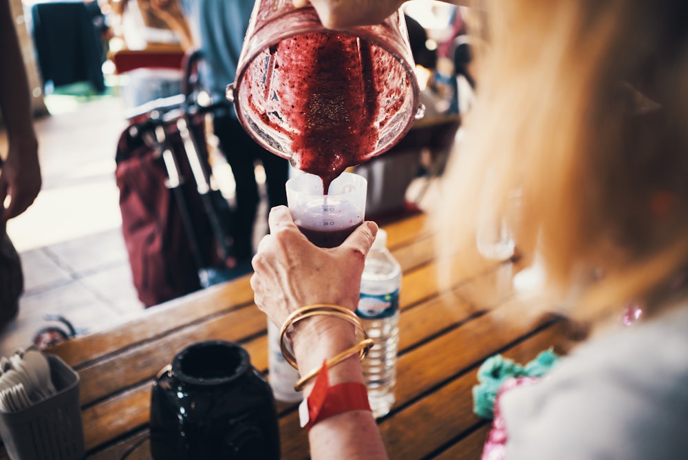 person holding pitcher