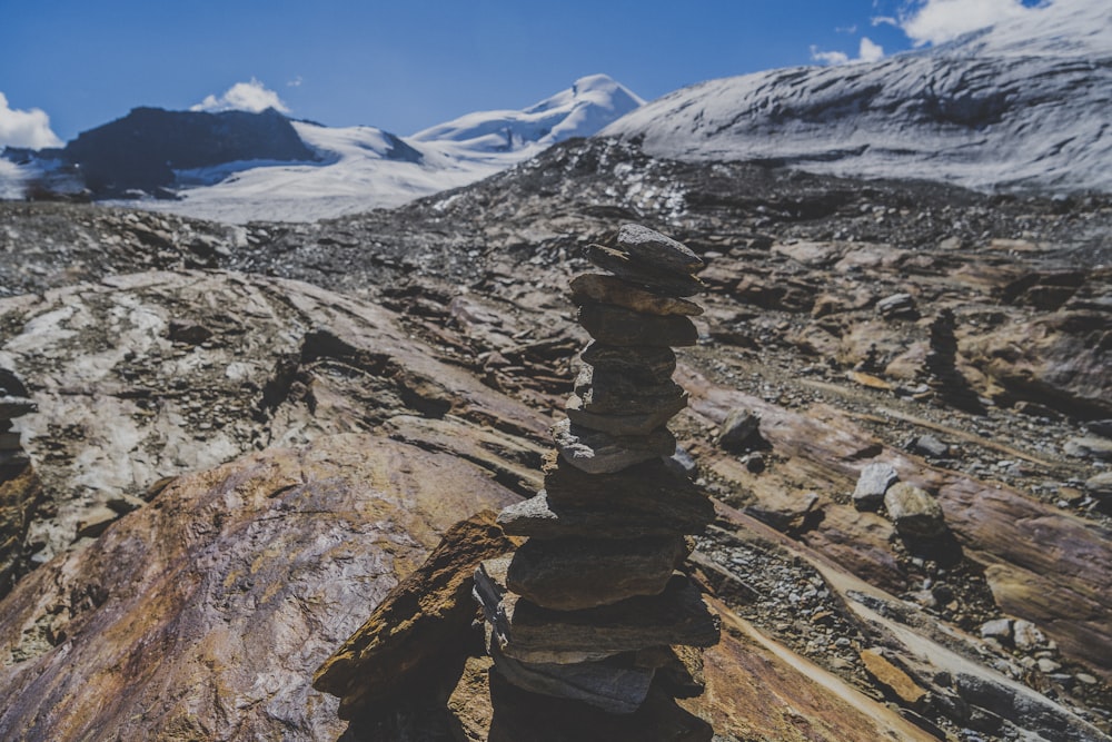 stone cairn on mountain peak