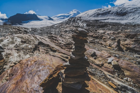 stone cairn on mountain peak in Saas-Fee Switzerland