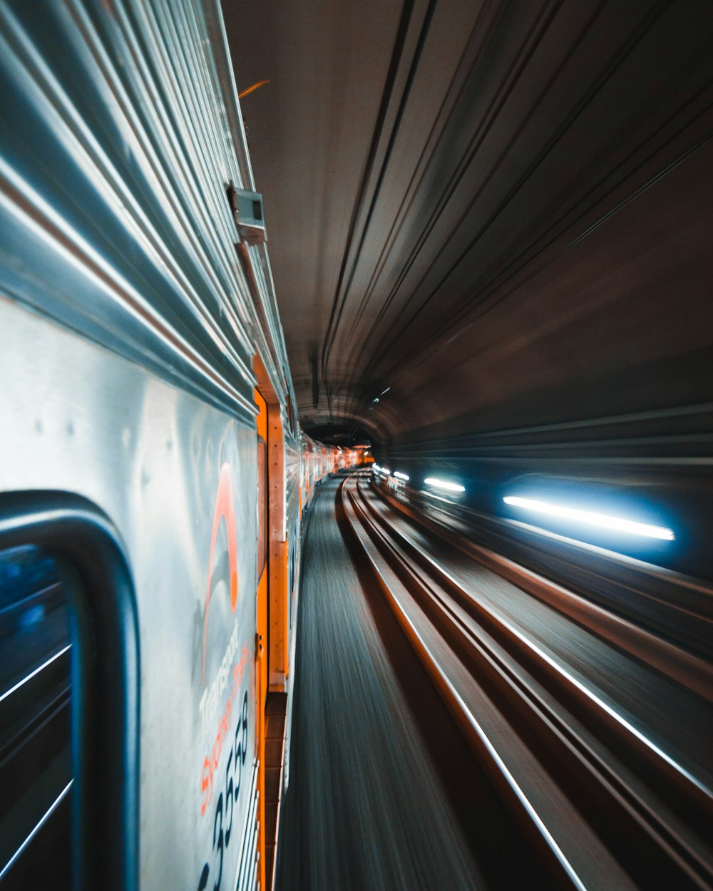 gray road in a tunnel