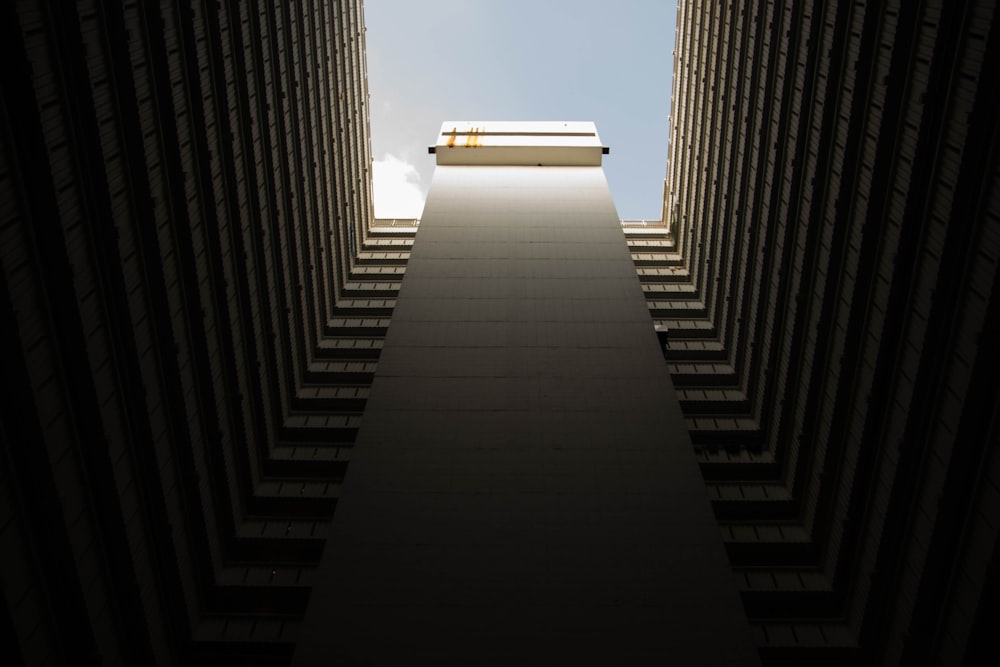 low-angle photography of high-rise building during daytime