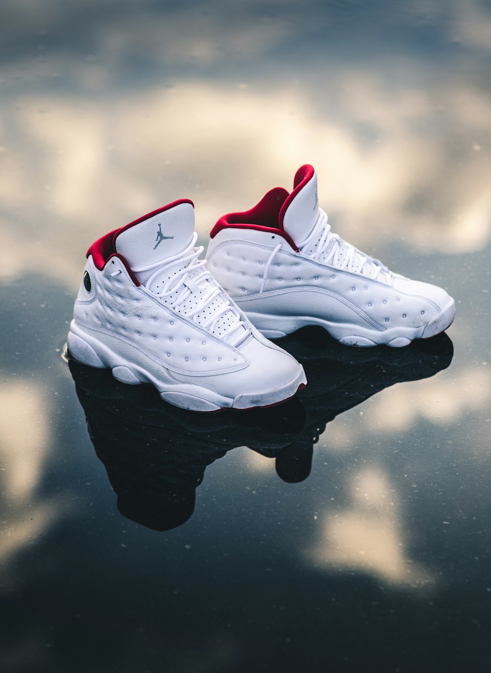 white-and-red Air Jordan 13's