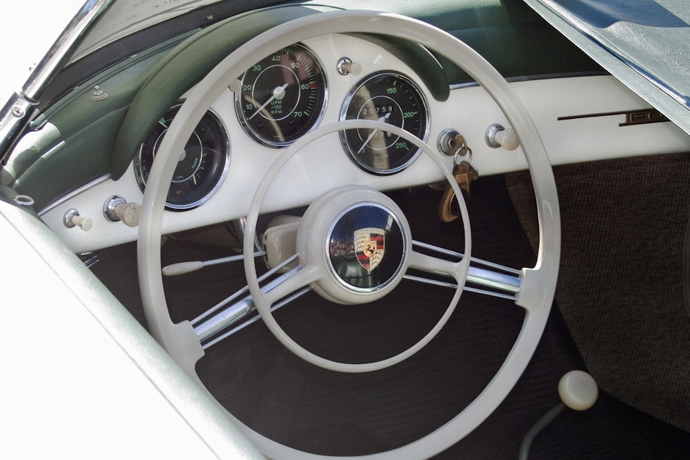 silver Porsche steering wheel