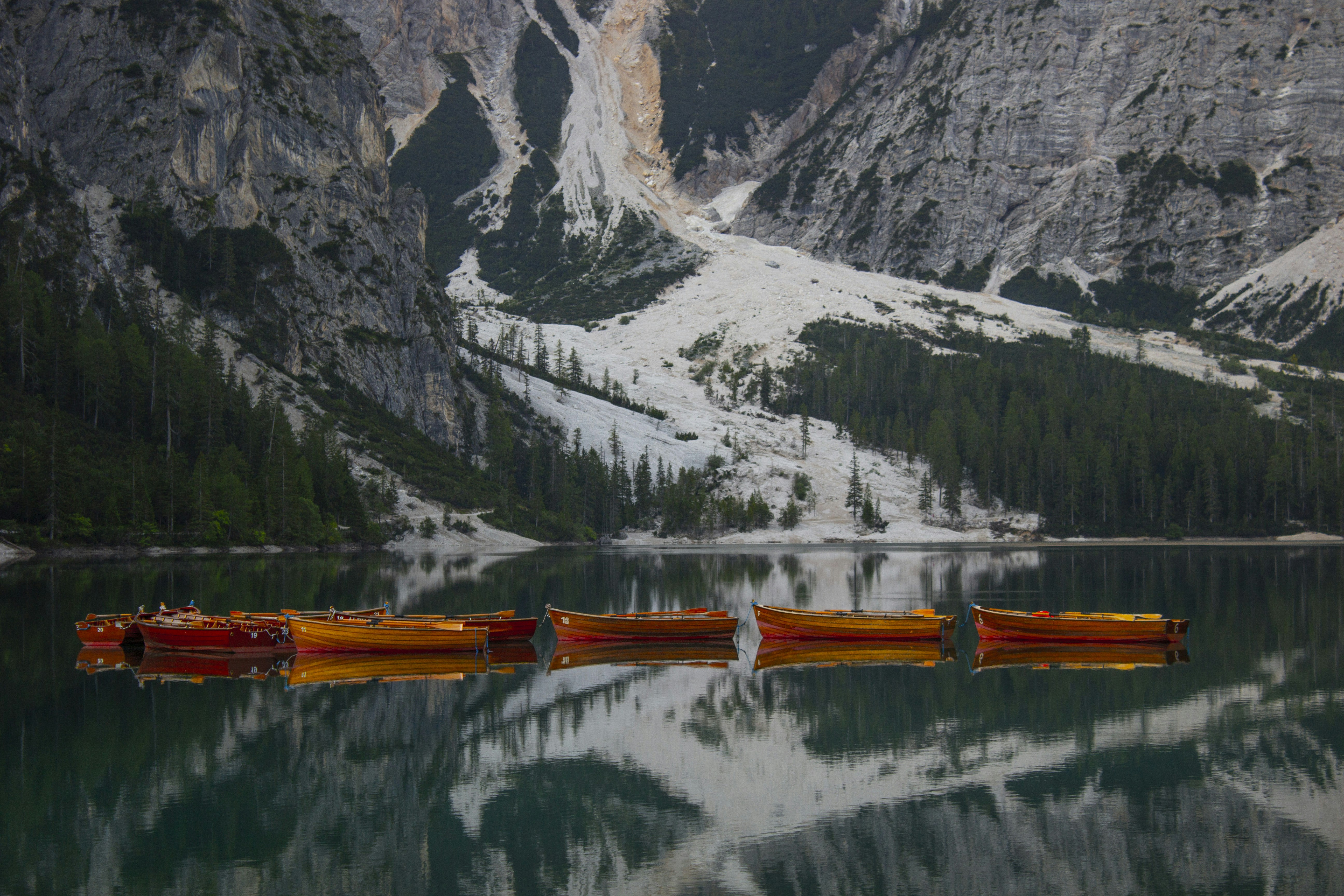 orange canoe on body of water, Calm
