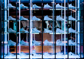 Bright, cozy display of carefully selected American sneakers in soft natural light with pastel backgrounds.