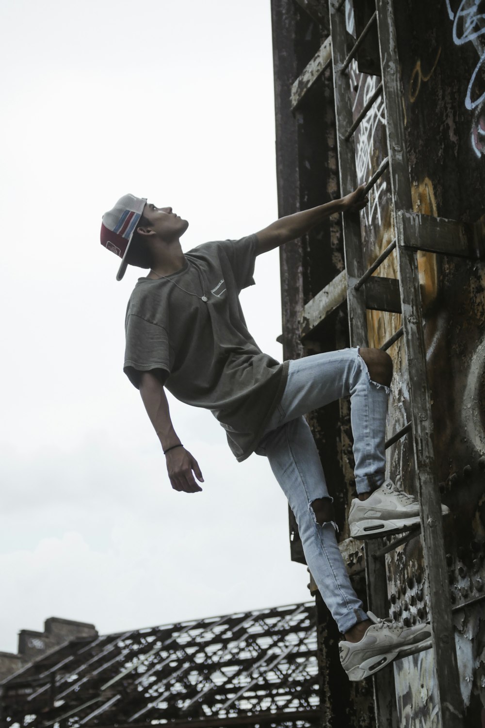 man climbing on ladder