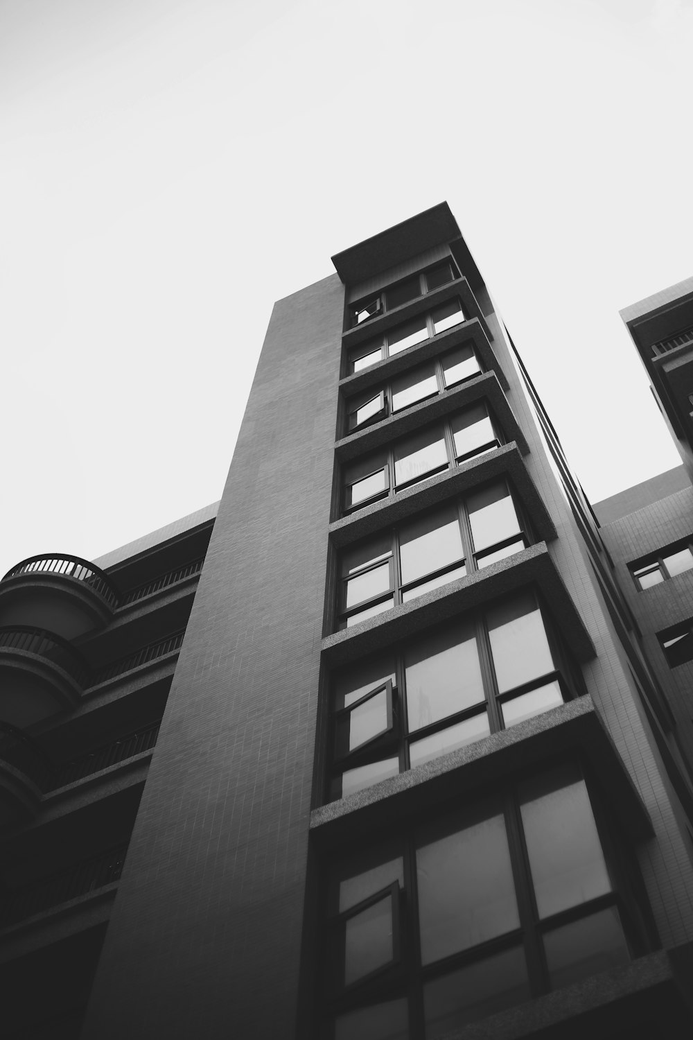 a black and white photo of a tall building