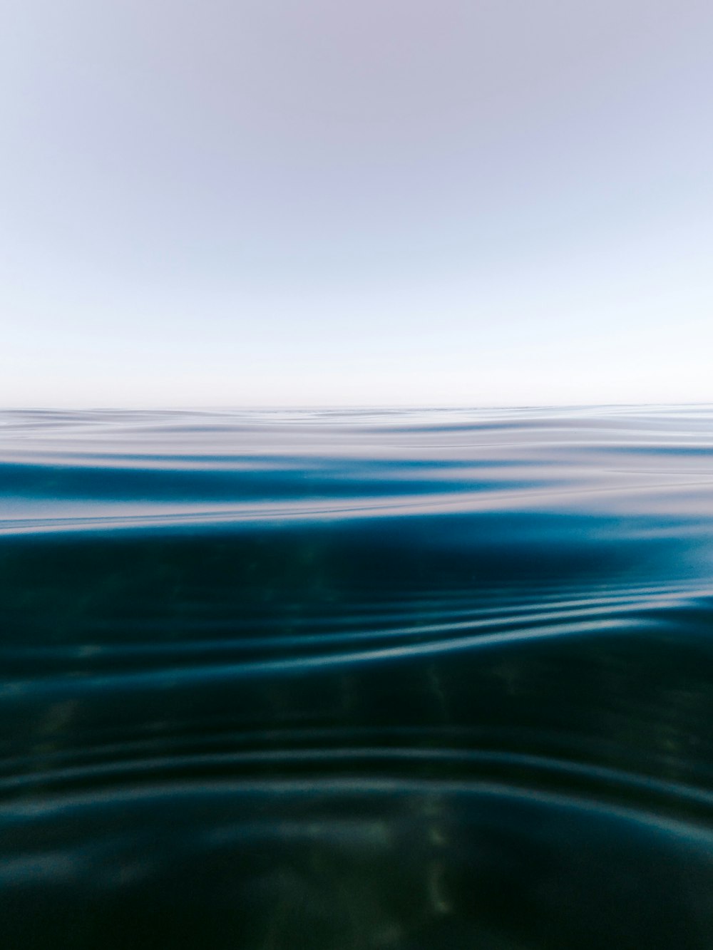 rippled body of water closeup photography