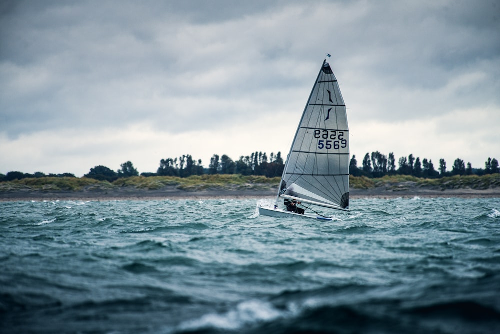 white boat on water