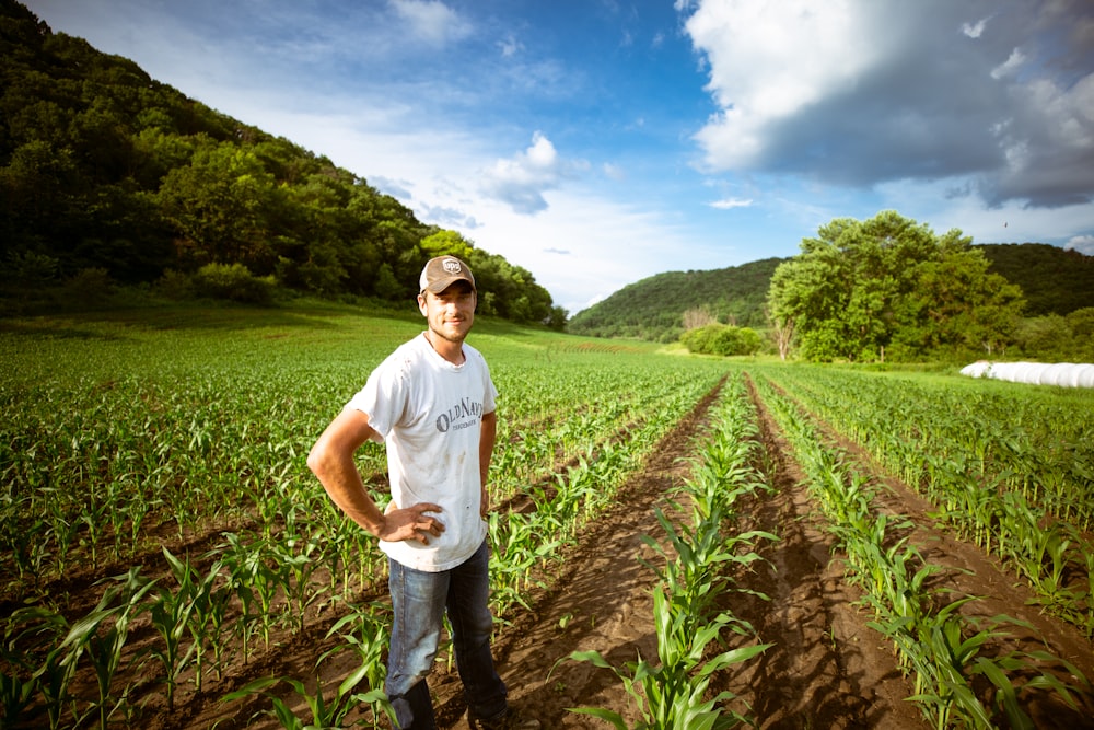 man standing on garden during daytime