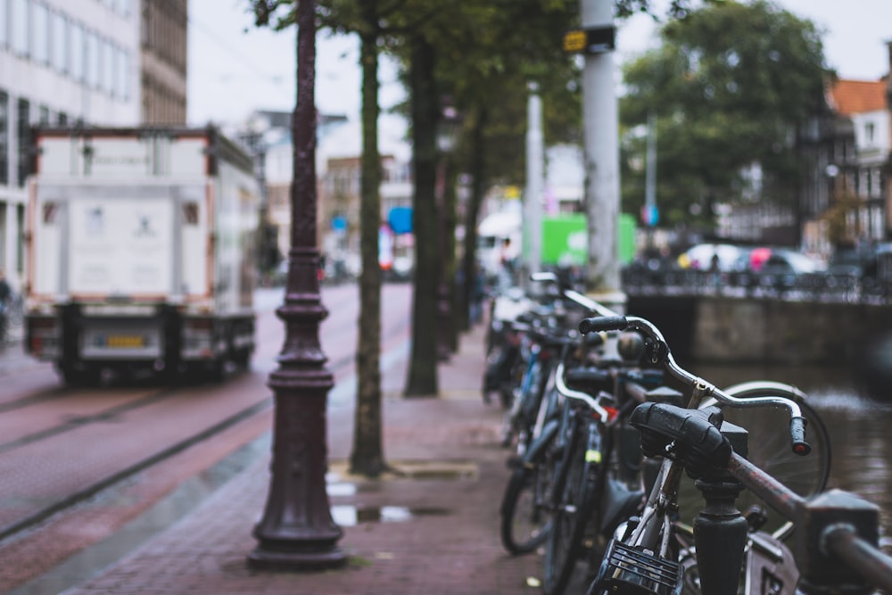 bicycles parked on sidewalk