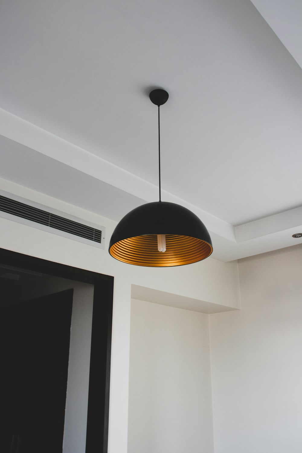 black and yellow pendant lamp