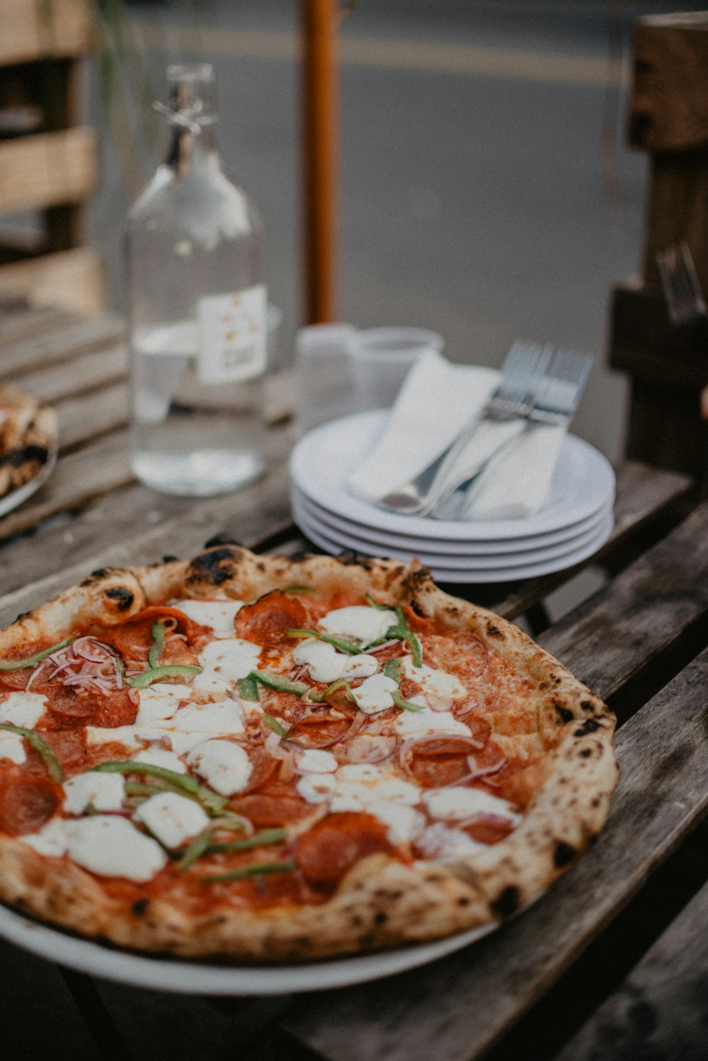 pizza with pepperoni on table