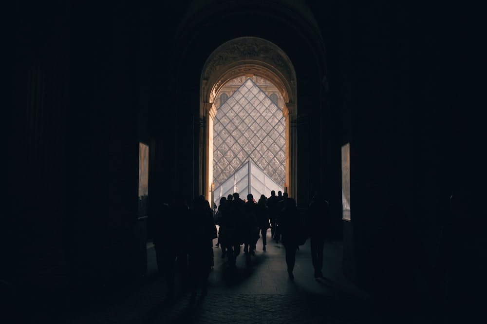 silhouette of people standing indoors