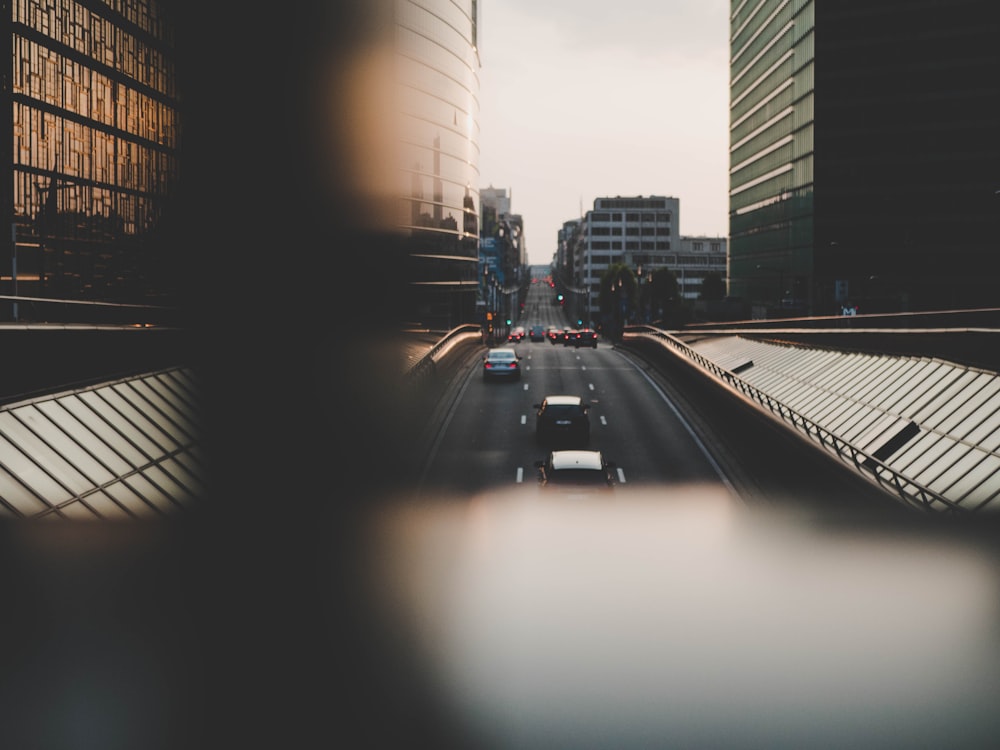 cars moving on concrete road