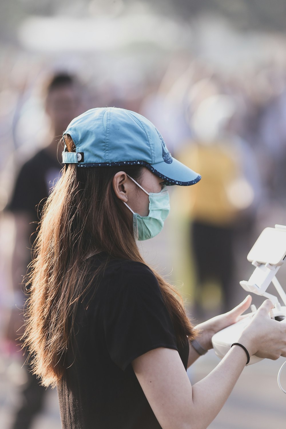 woman holding radio controller