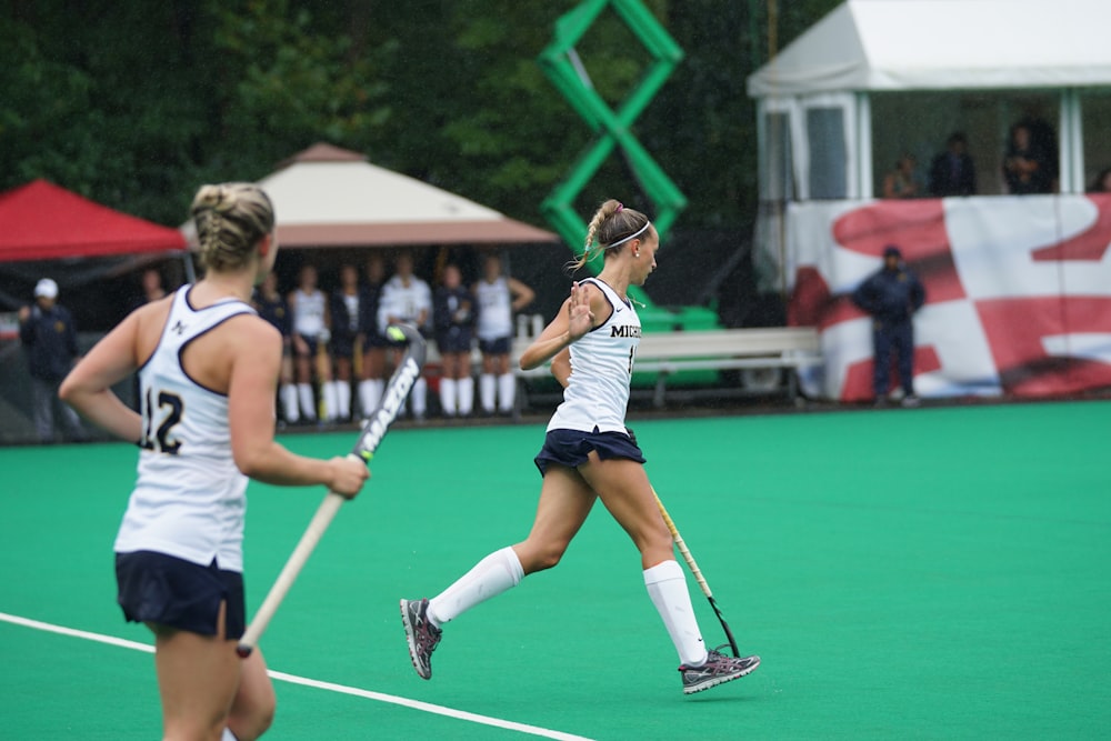 two woman playing sport