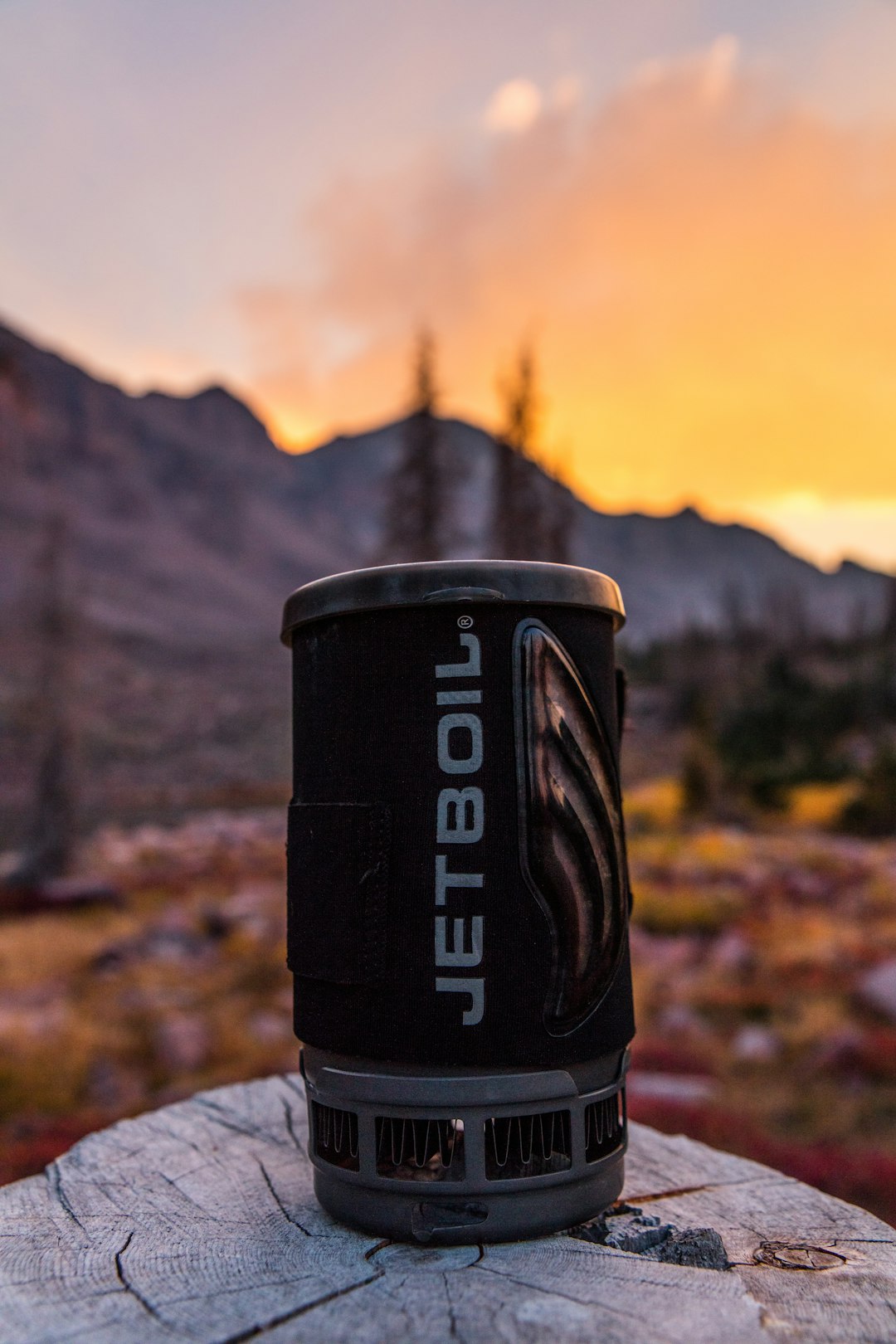 focus photography of Jetboil canister during golden hour