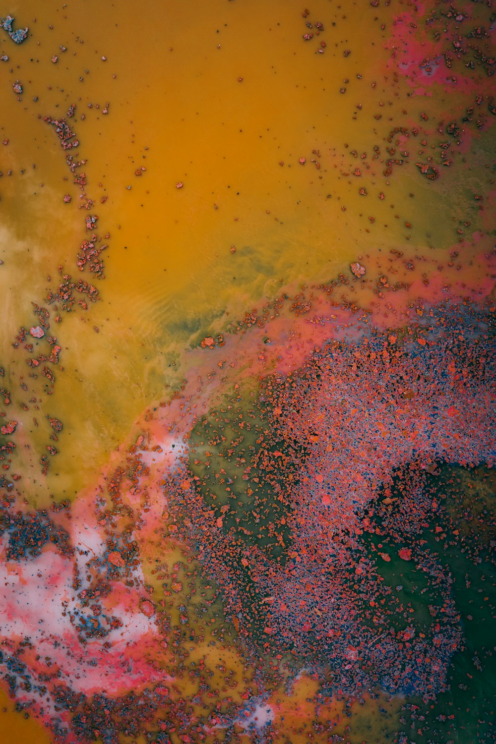 a close up of a yellow and pink substance