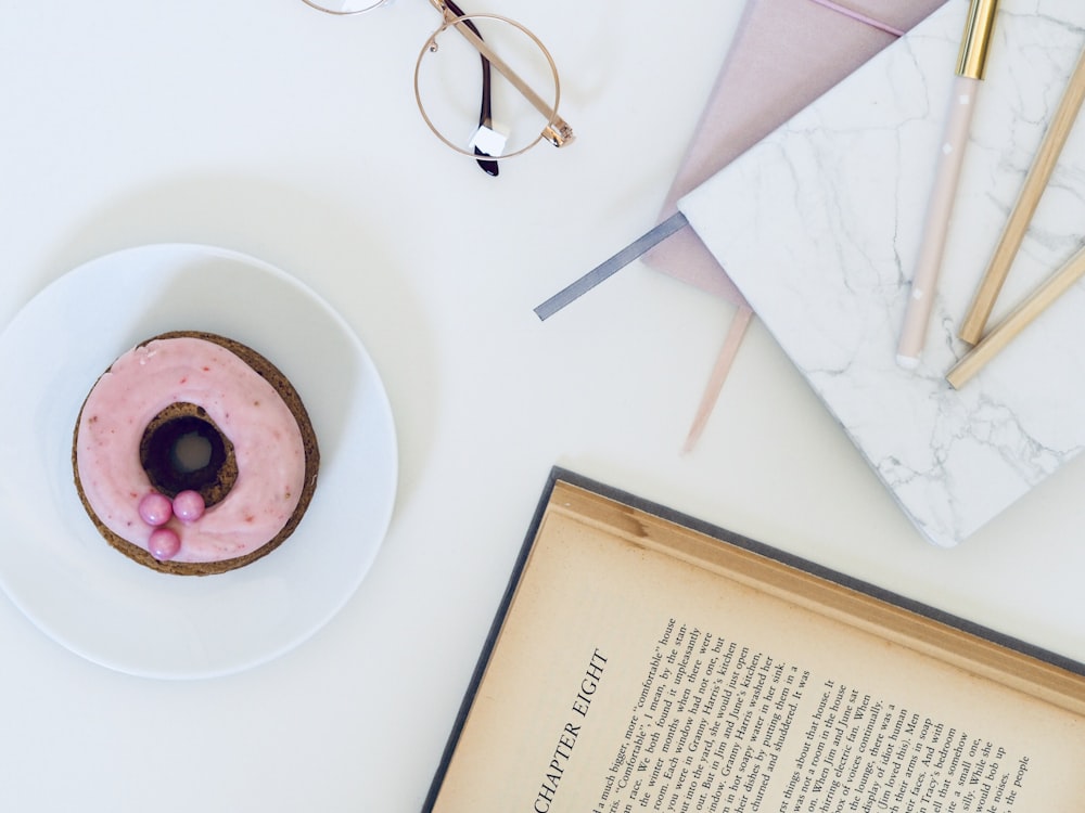 donut on white ceramic saucer