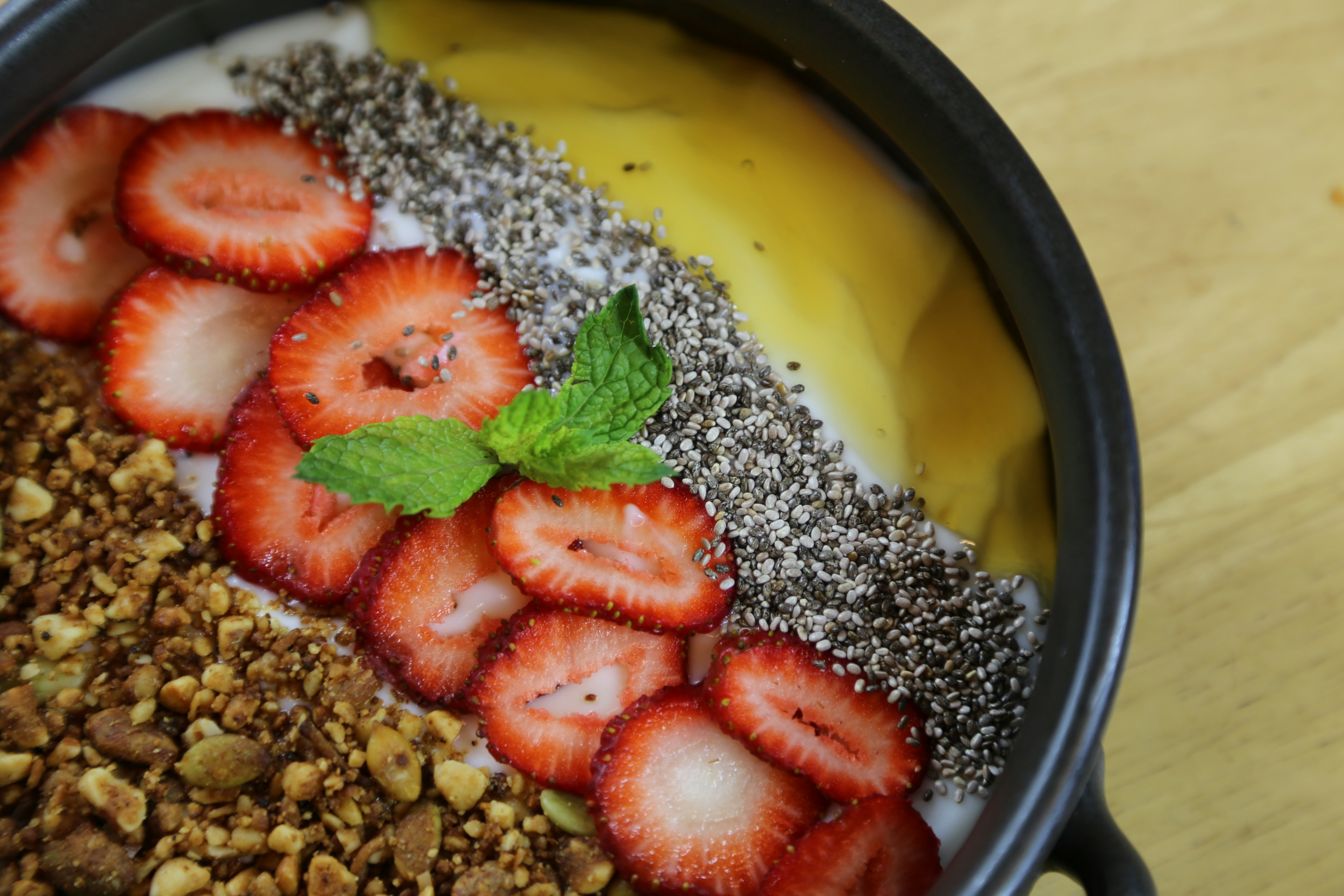 Smoothie bowl with strawberries, chia and granola