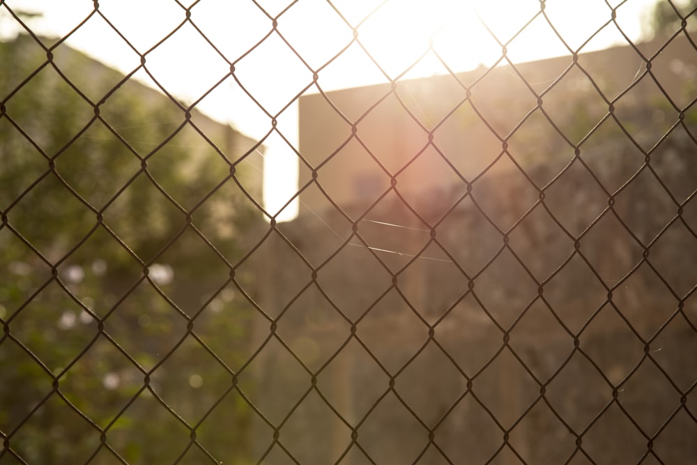 grey metal fence during daytime