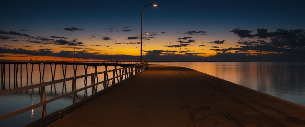 brown light post on dock