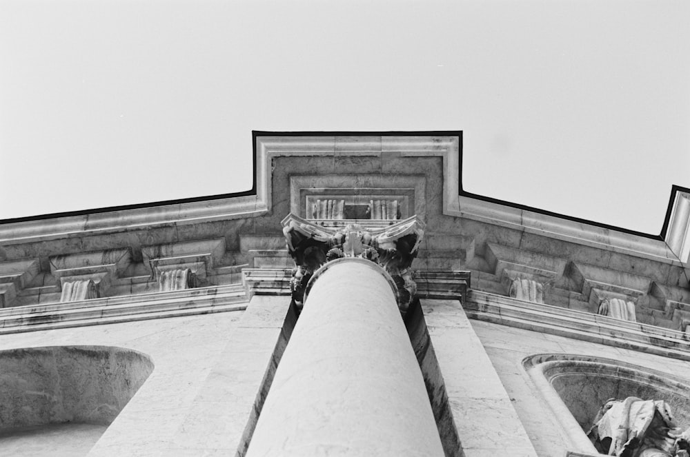 grayscale and low angle photo of building