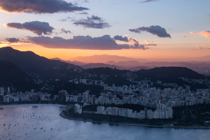 Copacabana beach at golden hour with the curved shoreline in view