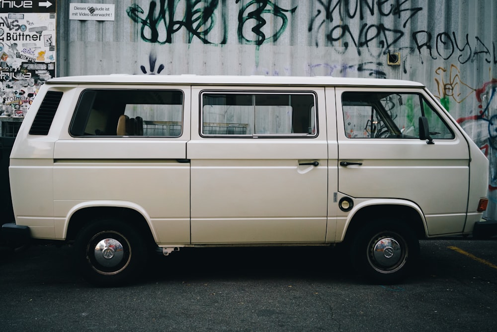 beige van parked on street