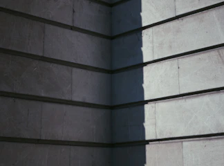 Modern home exterior featuring sleek decorative concrete block walls.