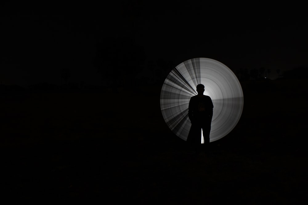 person standing with light reflection