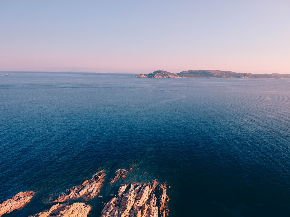 calm body of water during daytime