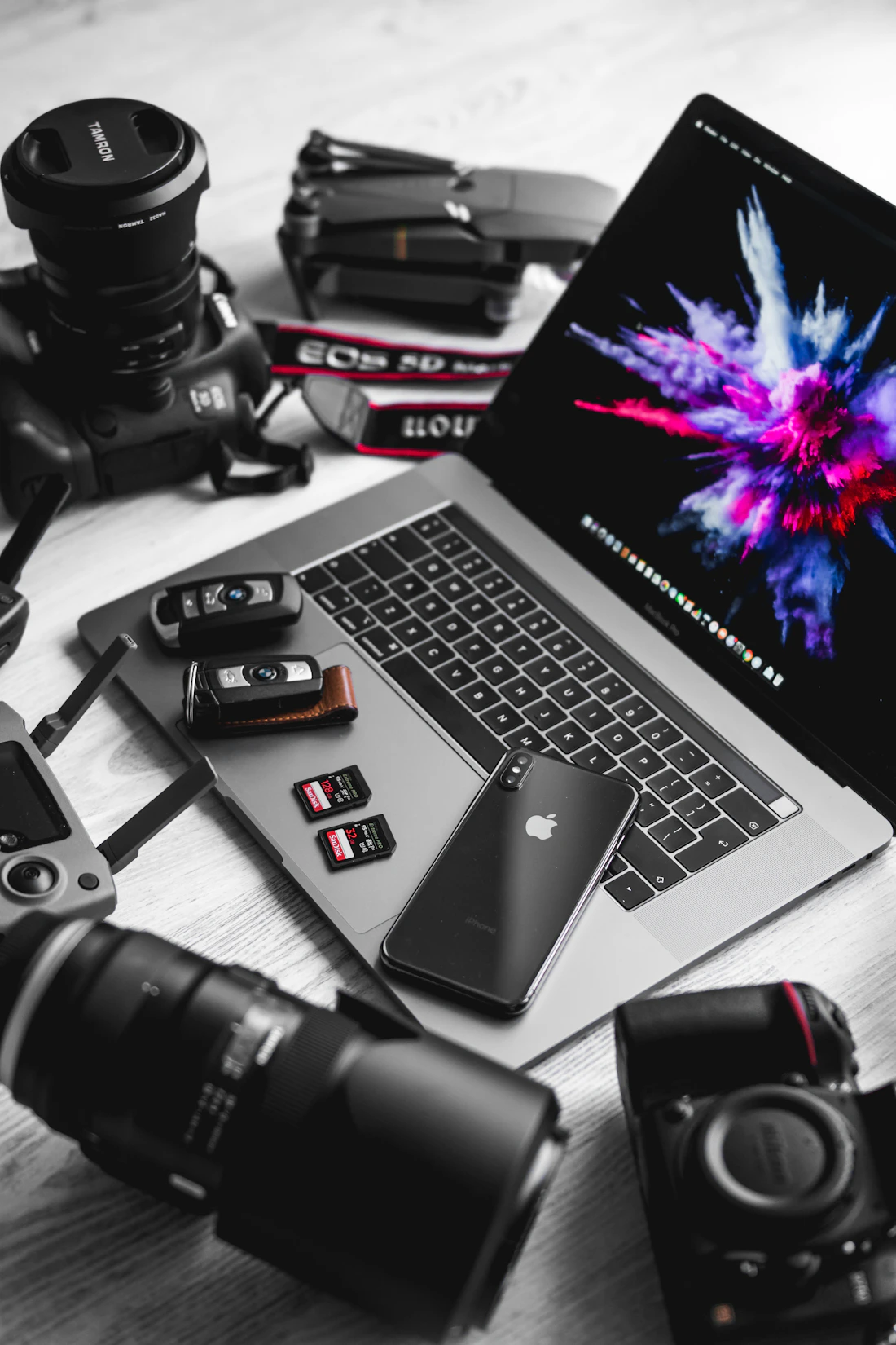 Photograph of a laptop and electronic accessories
