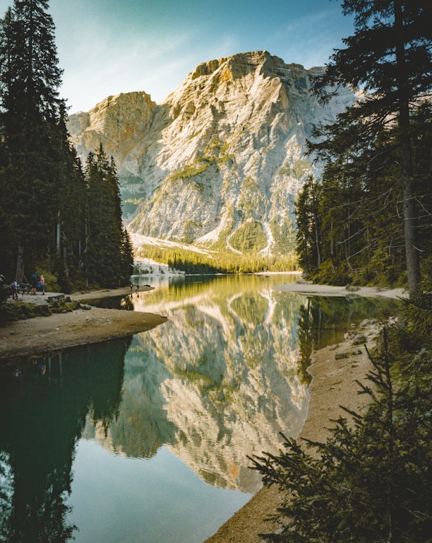 landscape photography of brown mountains and river