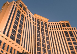 low angle photography of gray concrete building