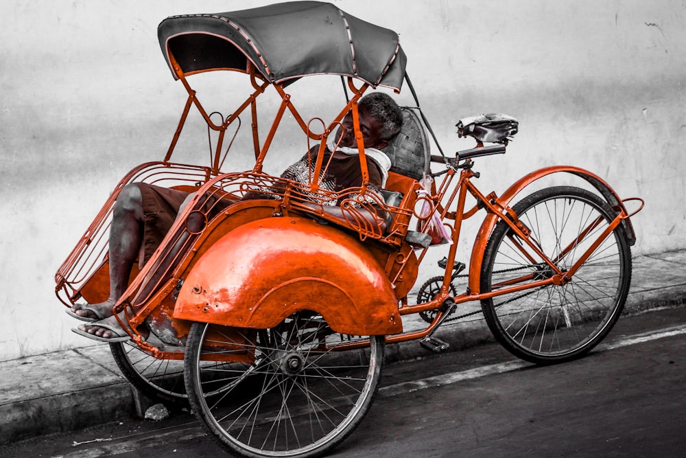 man sitting on the trike