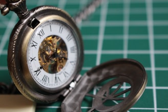 Close-up of a vintage watch being carefully examined for appraisal.