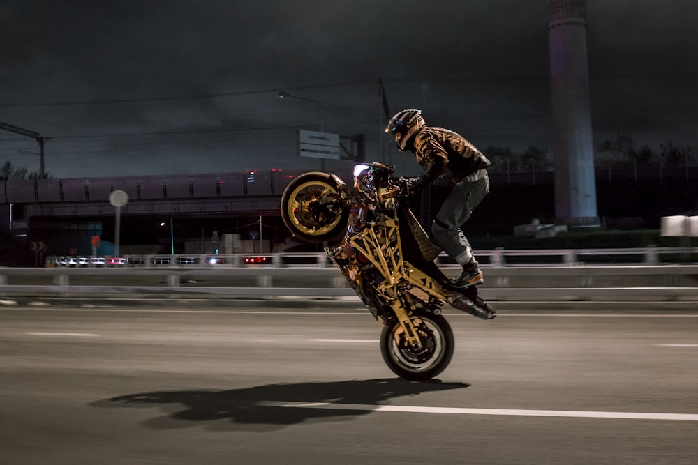 person riding on motorcycle