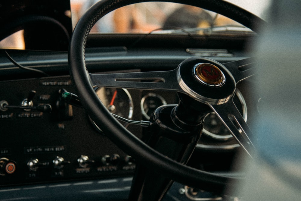 closeup photo of vehicle steering wheel