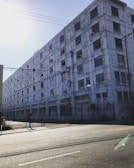 Exterior shot of the athena fashions manufacturing building on a sunny day.