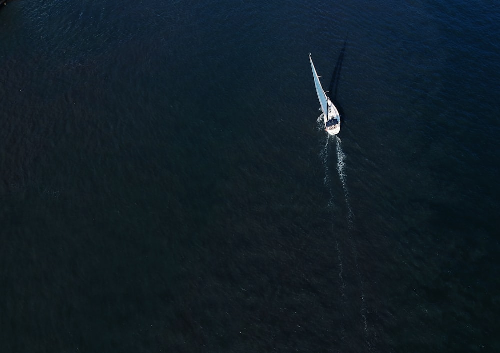 a small boat in a large body of water